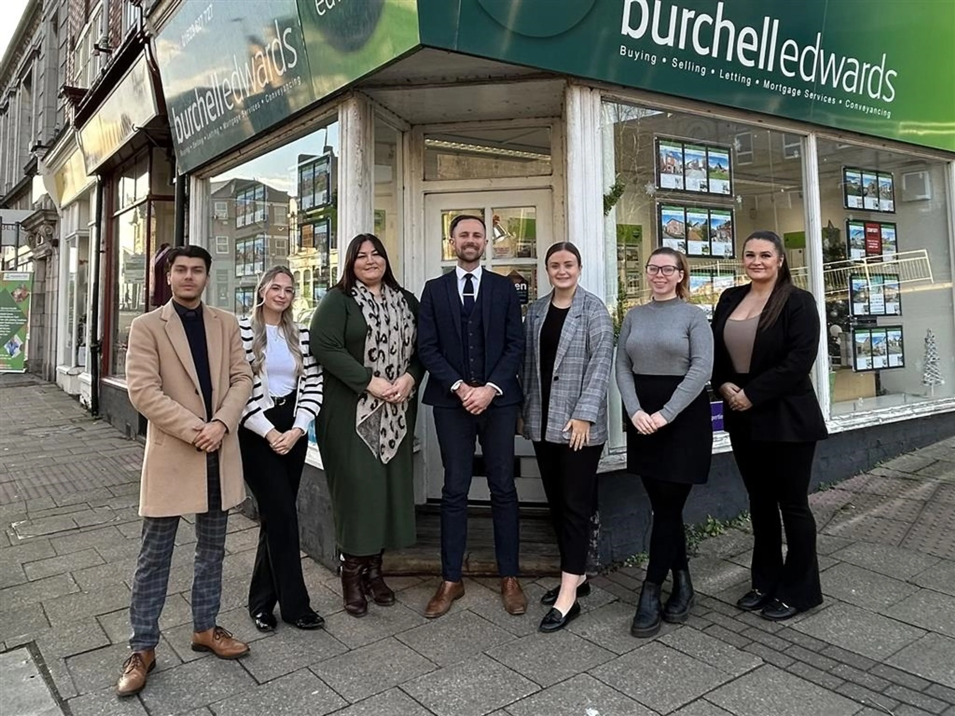 Front left to right: Lewis, Abi, Christie, Joshua, Phoebe, Holly & Molly. Buy or Sell with Burchell Edwards!
