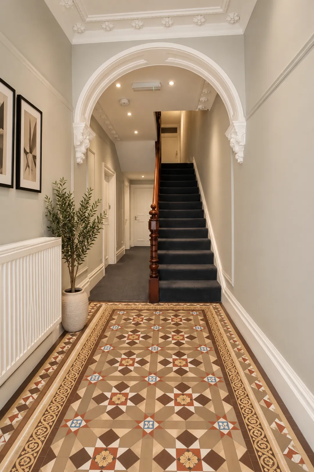 Victorian-Hallway-with-Ornate-Staircase.png