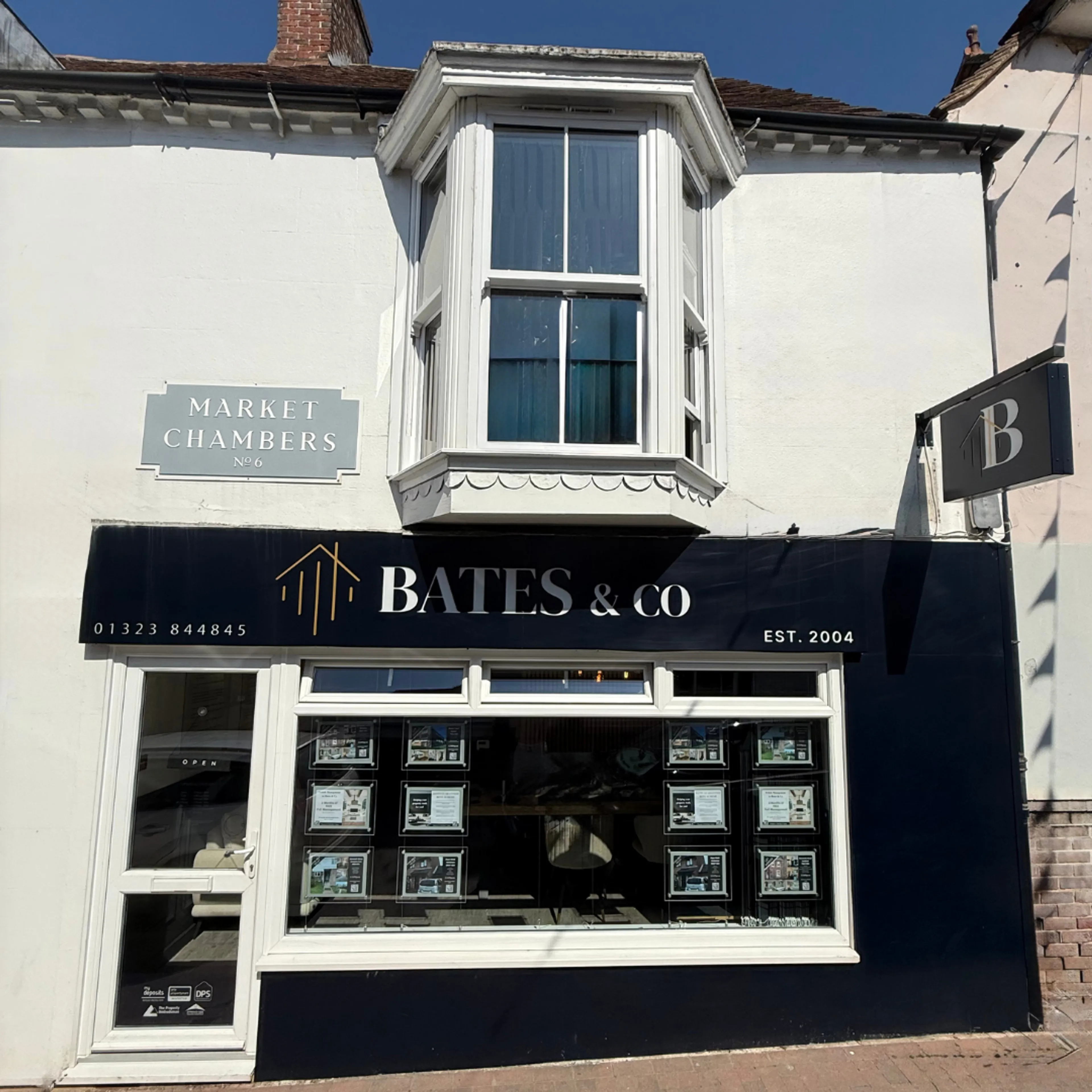 https://mr0.homeflow-assets.co.uk/files/media/image/0000/0000/58086b9f31d4ad00e0e6d0cacfe93d04/bates_shop_front_square.png