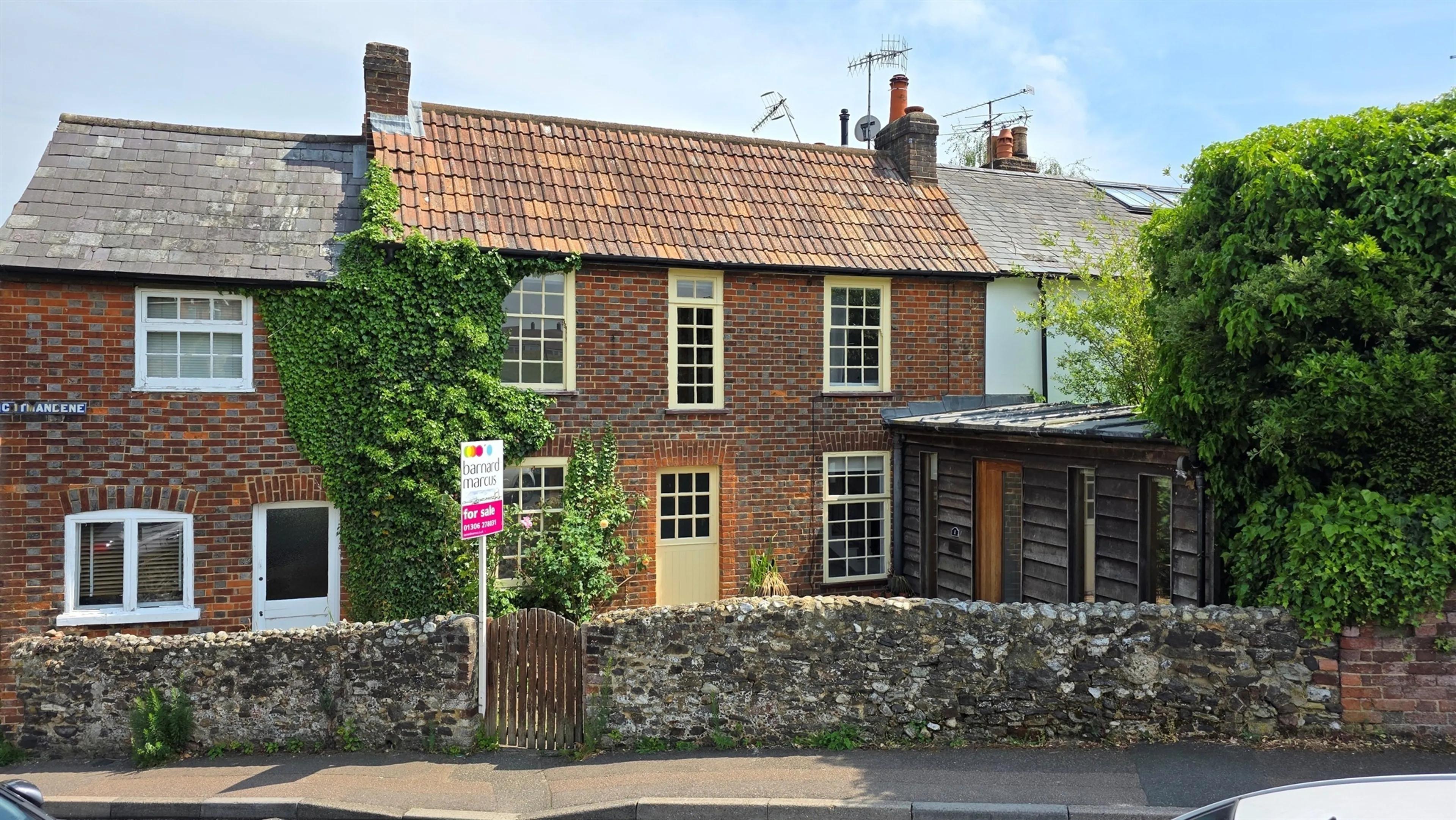Property at Cotmandene, Dorking