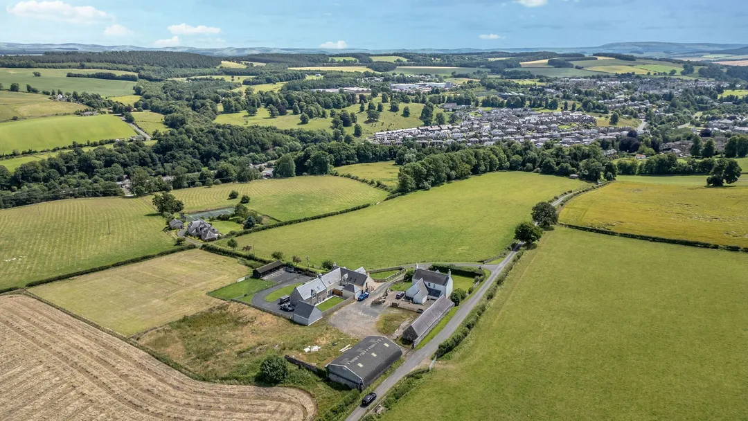 https://mr0.homeflow-assets.co.uk/files/photo/image/47203/6082/_x_/SharplawRoad-Drone7.jpg