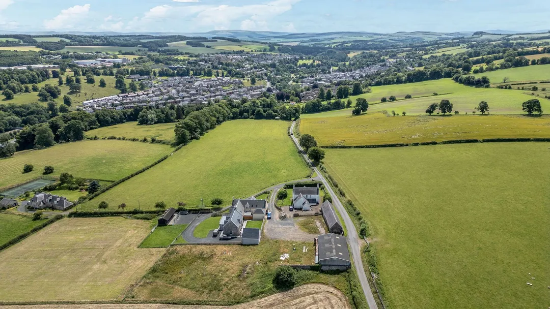 https://mr0.homeflow-assets.co.uk/files/photo/image/47499/0569/_x_/SharplawRoad-Drone8.jpg