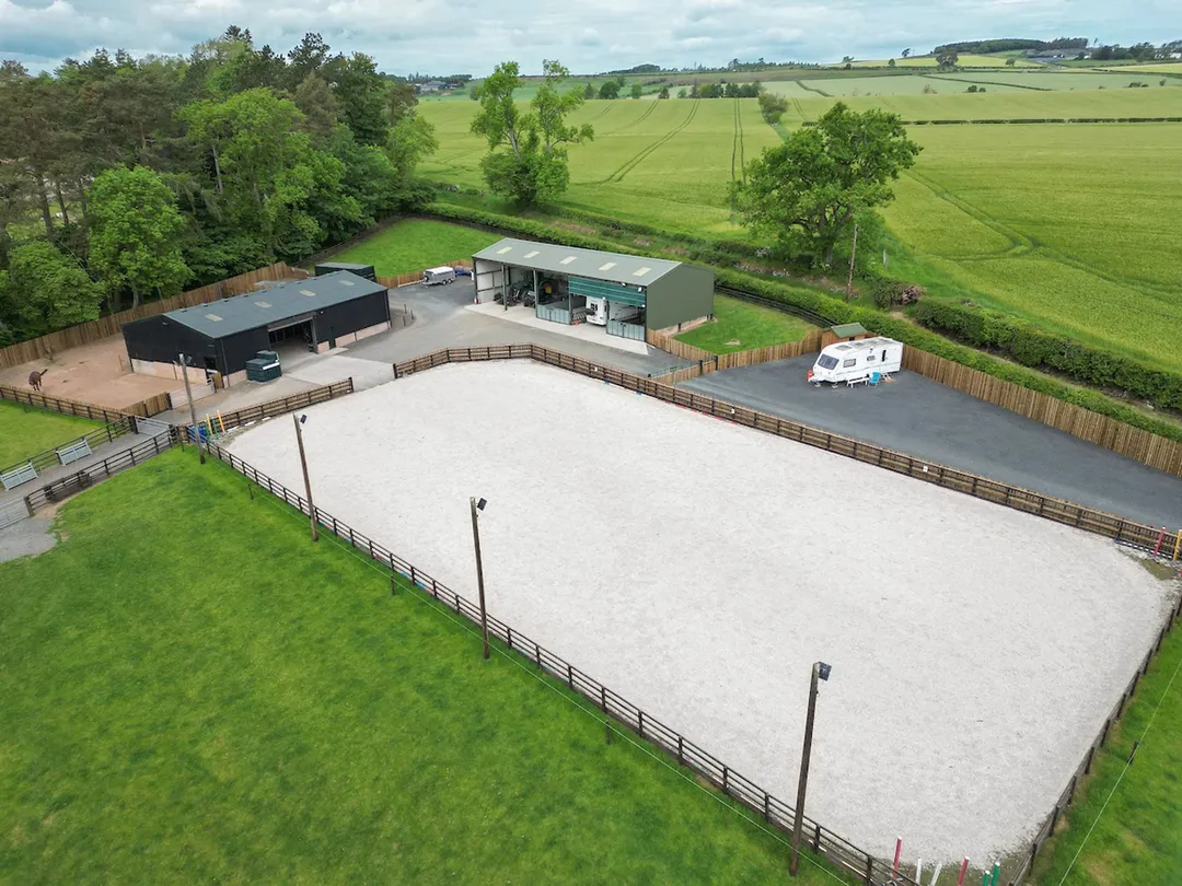 https://mr0.homeflow-assets.co.uk/files/photo/image/48179/7535/_x_/Cakemuir-STABLES-DRONE-17.jpg
