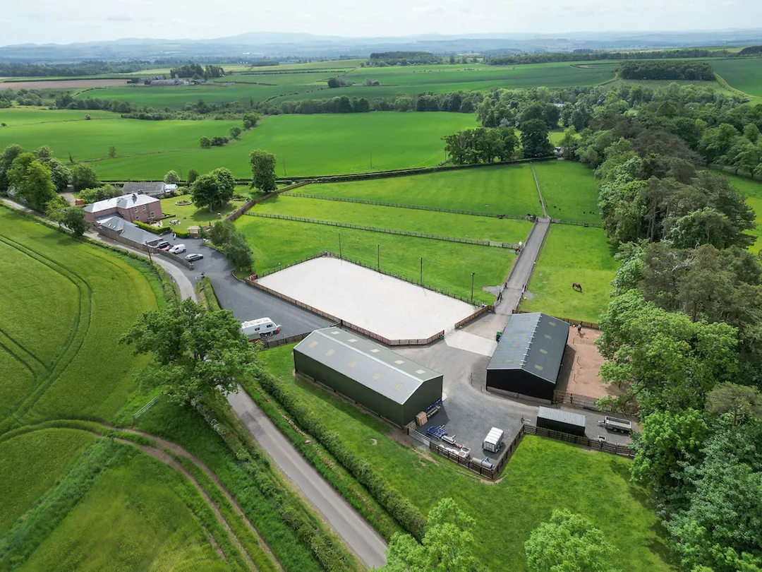 https://mr0.homeflow-assets.co.uk/files/photo/image/48179/7553/_x_/Cakemuir-STABLES-DRONE-2.jpg
