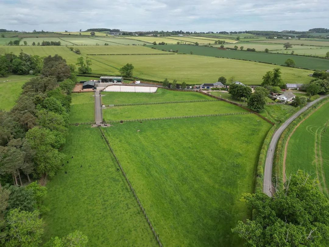 https://mr0.homeflow-assets.co.uk/files/photo/image/48179/7556/_x_/Cakemuir-STABLES-DRONE-12.jpg