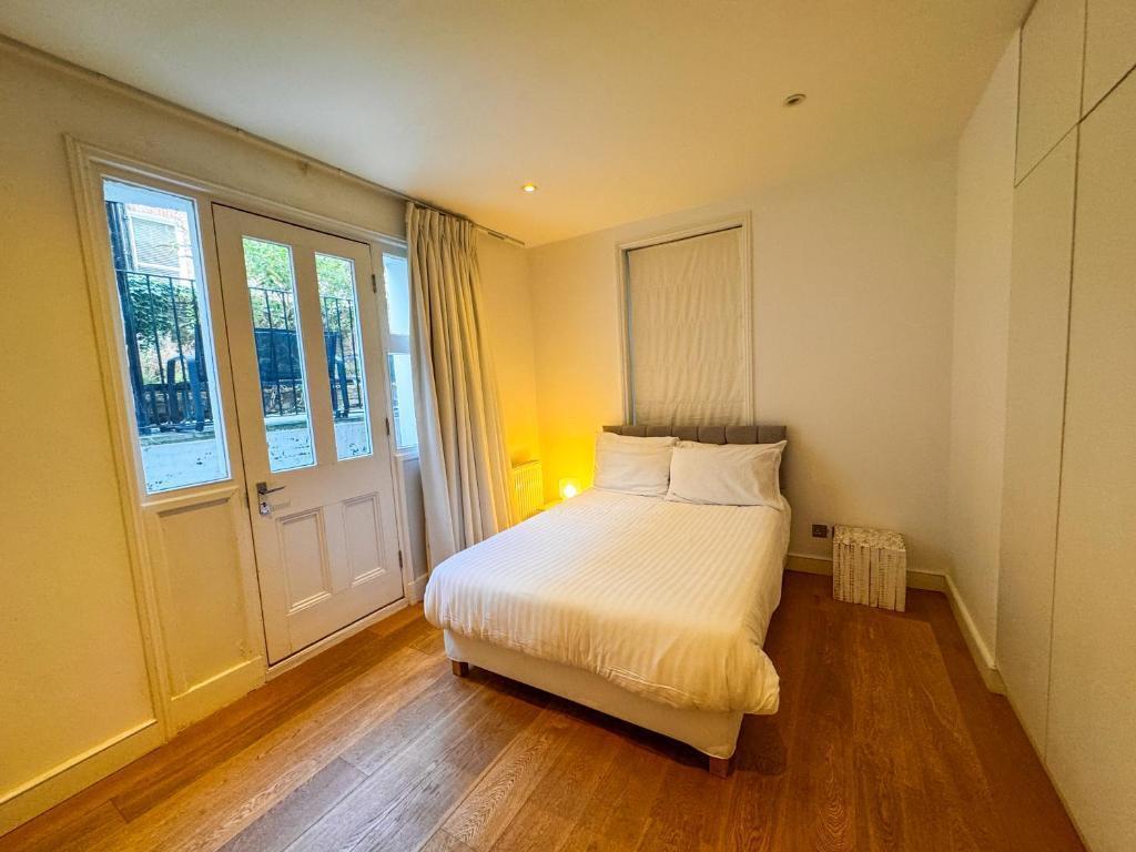 Flat 1, Comeragh Road, London Image 12
