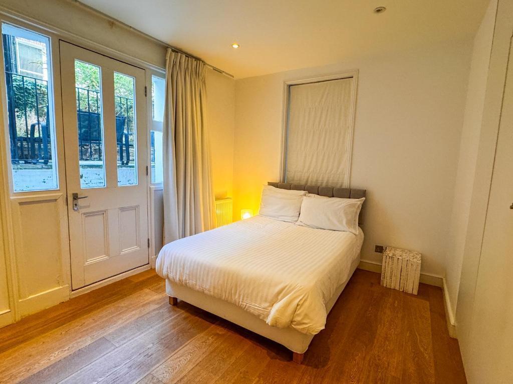 Flat 1, Comeragh Road, London Image 14